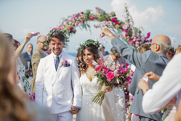 Romantic summer wedding in Kefalonia with bougainvillea