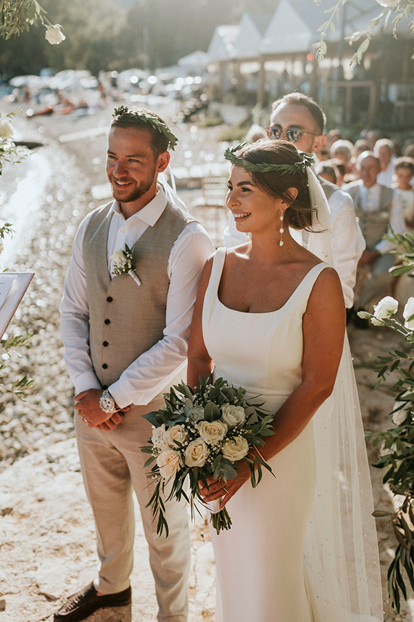 beach-summer-wedding-corfu-white-blooms-lush-olive-leaves_25