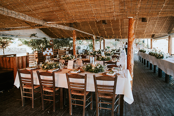 beach-summer-wedding-corfu-white-blooms-lush-olive-leaves_31