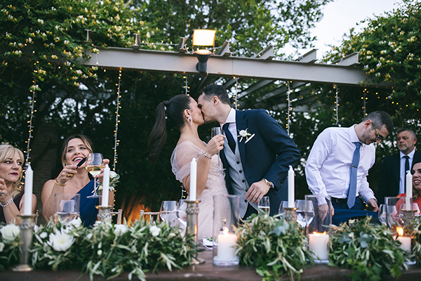 Romantic chic wedding at Wine Museum in Athens with olive leaves and white florals │ Athina & Dimitris