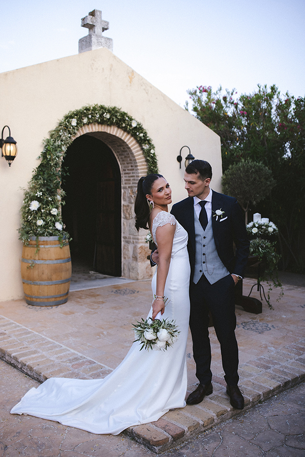 romantic-chic-wedding-wine-museum-athens-olive-leaves-white-florals_24