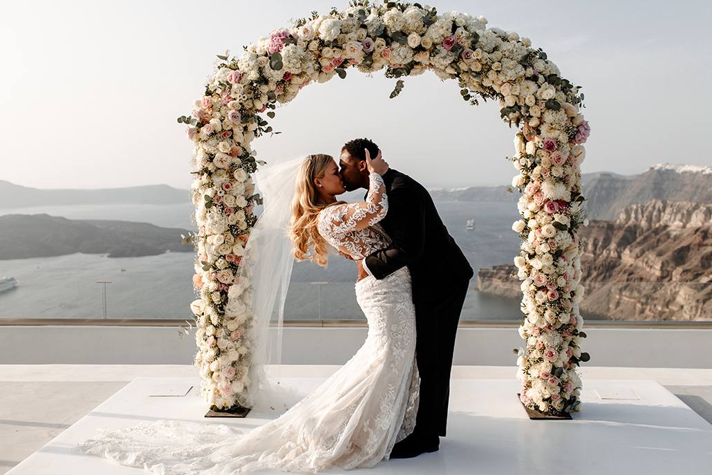 Timeless wedding in Santorini with lush flowers | Amanda & Alaxic