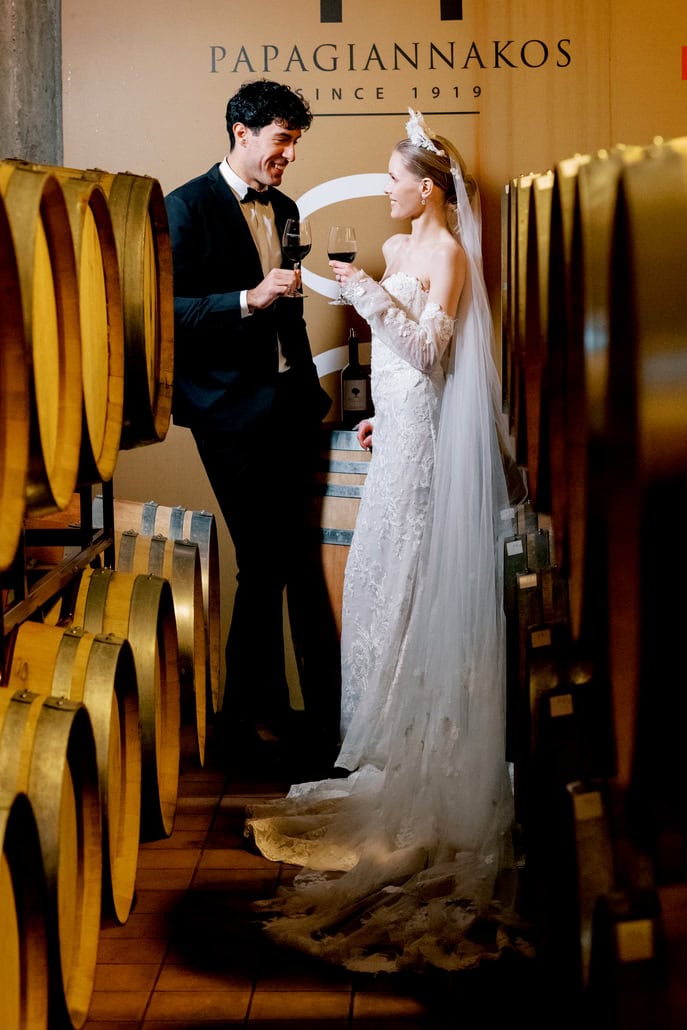 Elegant styled shoot at a winery with romantic red florals