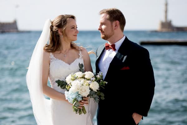 A heartfelt summer wedding in Crete surrounded by blue florals | Monika & Nicolas