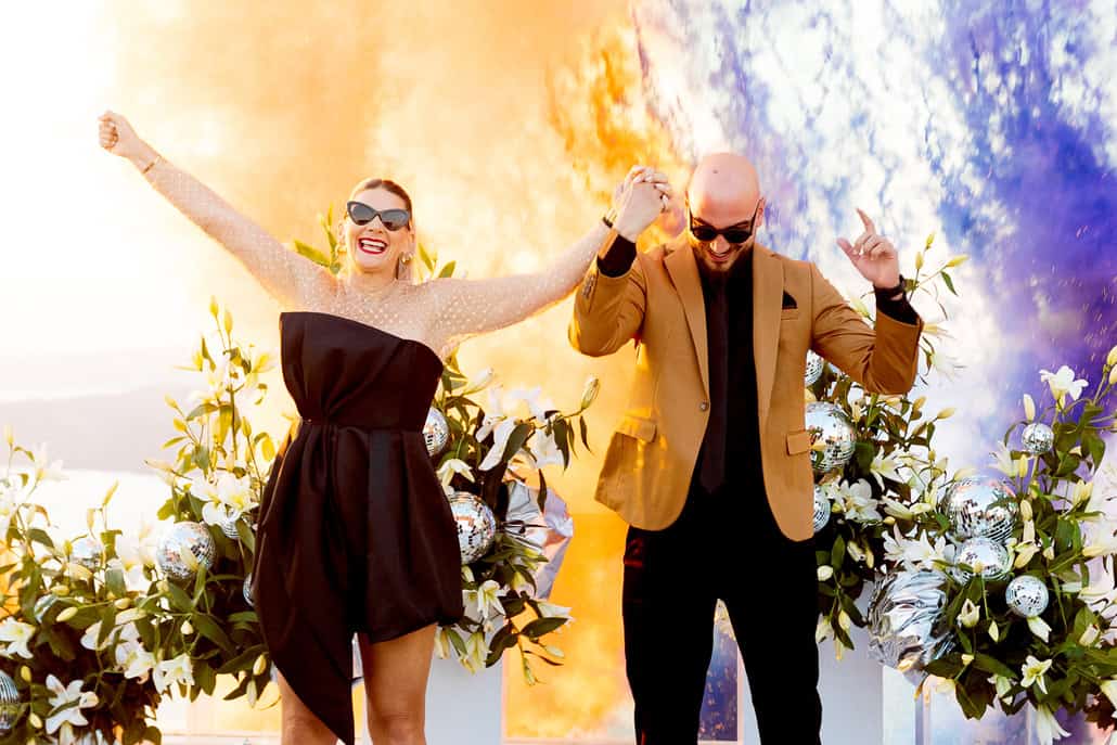 Spectacular prewedding party in Santorini with disco vibes | Stefania & Panagiotis