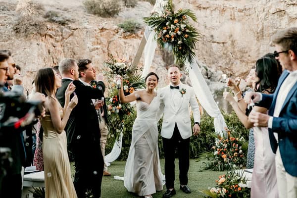 Romantic destination wedding at Lake Vouliagmeni with tropical details | Mandy & Oscar