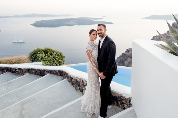Romantic next day photoshoot in Santorini overlooking the breathtaking caldera | Stefi & Stratis