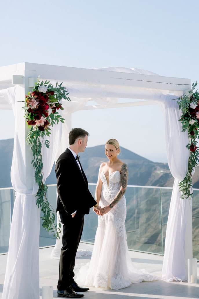 Romantic destination wedding in Santorini with caldera views | Briarna & Logan