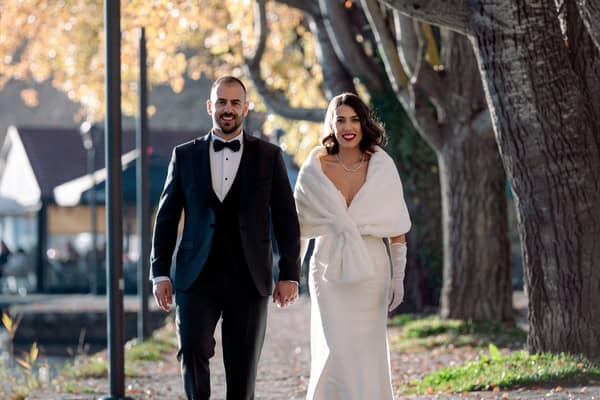 A romantic winter wedding in Kastoria with white and red blooms | Ioanna & Emmanouil