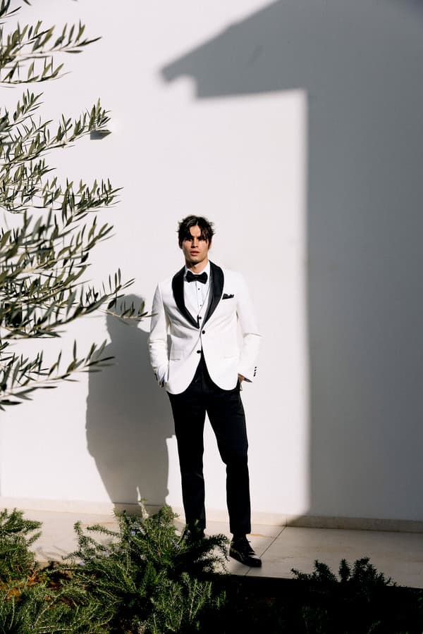White Tuxedo Groom Look Carlitos