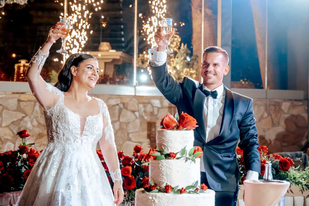 Festive chic wedding with rich red roses | Elena & Themis
