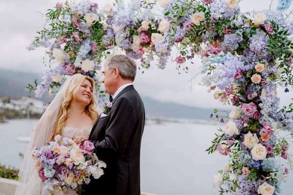 Romantic destination wedding in Elounda with lilac and blush details | Negar & David