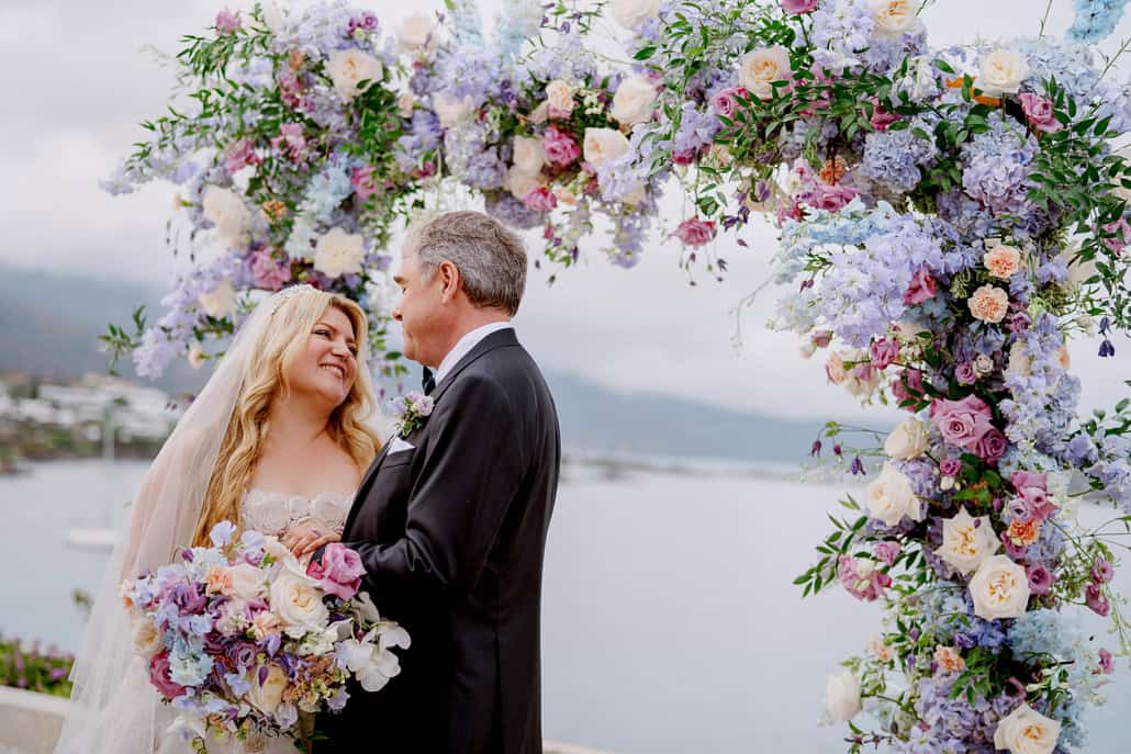 Romantic destination wedding in Elounda with lilac and blush details | Negar & David