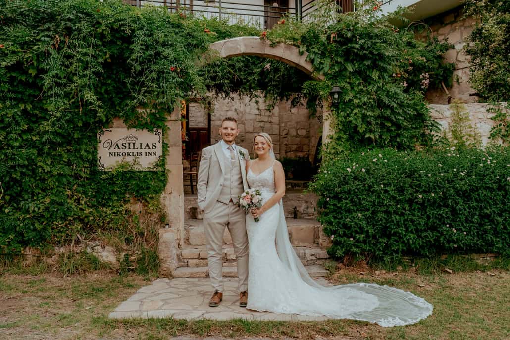 Romantic destination wedding at Vasilias Nikoklis Inn with roses and lisianthus | Sophie & Jack