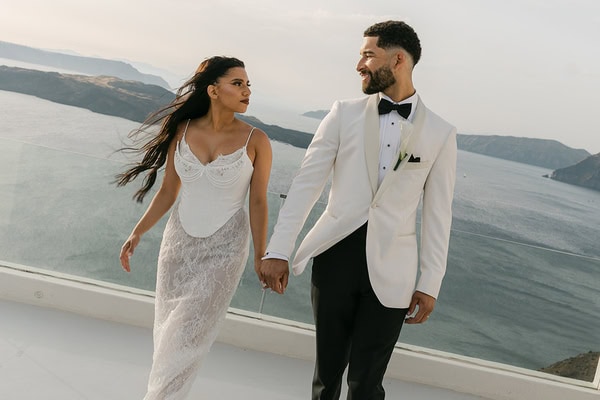 Stylish spring wedding in Santorini with breathtaking caldera views | Kelly & Abdiel