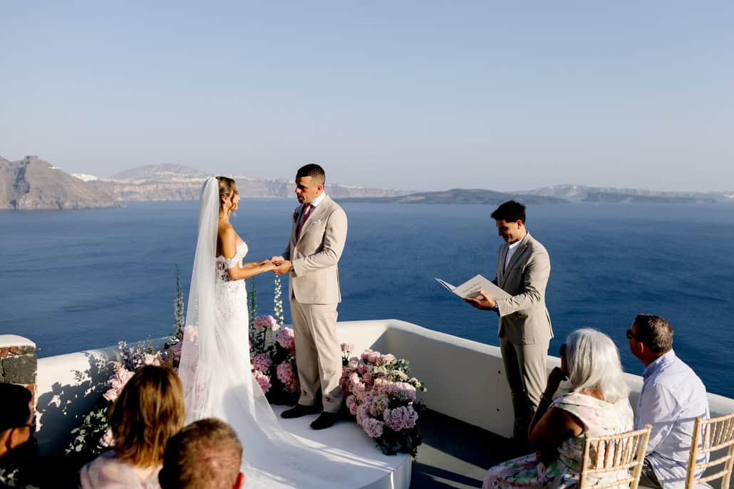 Dreamy garden style destination wedding in Santorini with blush and white florals | Miho & David