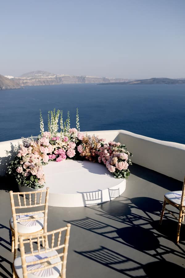 Dreamy Garden Style Destination Wedding In Santorini With Blush And White Florals